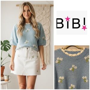 BiBi Light Blue Sweater with White Floral Accents